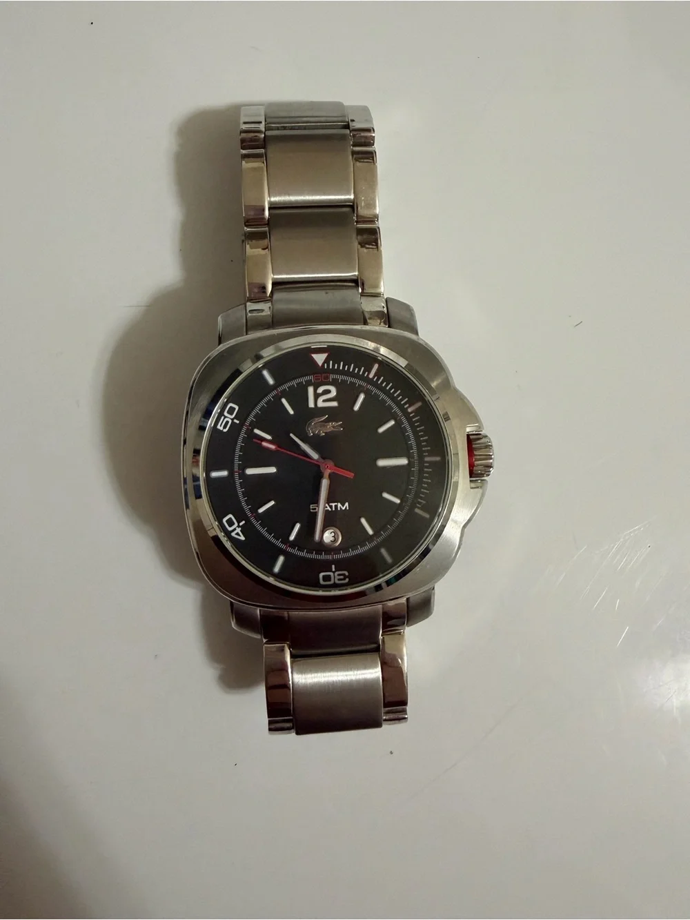 Lacoste Silver Stainless Steel Watch with Black Dial and Red Accents